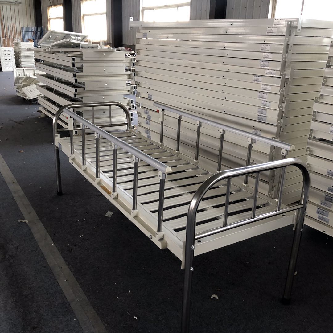 simple hospital bed with rails